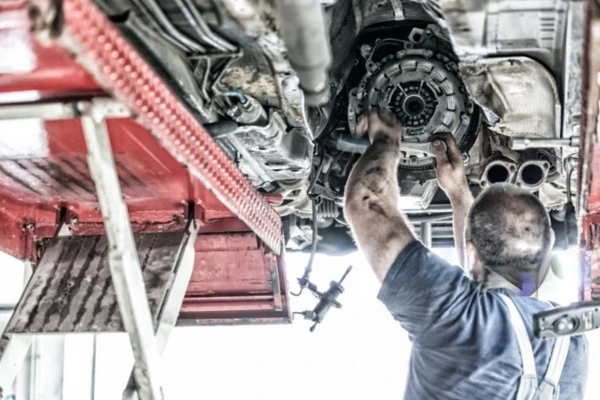 Mechanic-checking-drivetrain-for-Dual-Mass-Flywheel-Noise