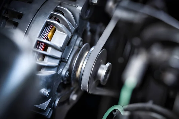 alternator-repair-pulley-and-engine-component-close-up