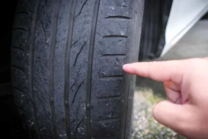 close-up-of-uneven-tyre-wear-on-tread-surface